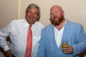 Photo of two men smiling